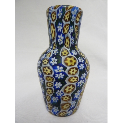 179 - Fratelli Toso - a fused millifiore cane glass vase of blue, white and yellow canes, baluster form,  ... 