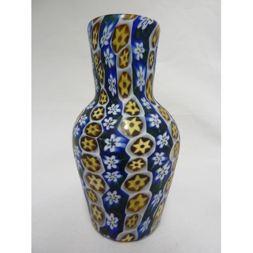 179 - Fratelli Toso - a fused millifiore cane glass vase of blue, white and yellow canes, baluster form,  ... 