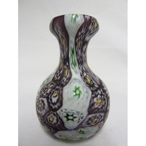 177 - Fratelli Toso - a small fused  millefiori cane glass vase, of onion form, the canes of deep purple, ... 