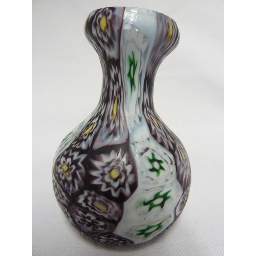 177 - Fratelli Toso - a small fused  millefiori cane glass vase, of onion form, the canes of deep purple, ... 