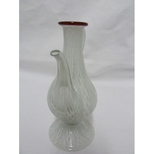 191 - Venetian Glass - a white latticino glass jug with raspberry red rim, c 1830, 14.2cm high