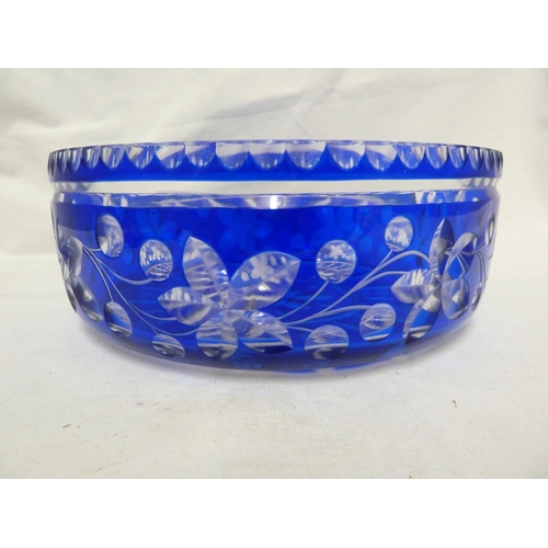 65 - Bohemian Glass - a cobalt blue overlay glass bowl, the blue cut through to colourless with a fruitin... 