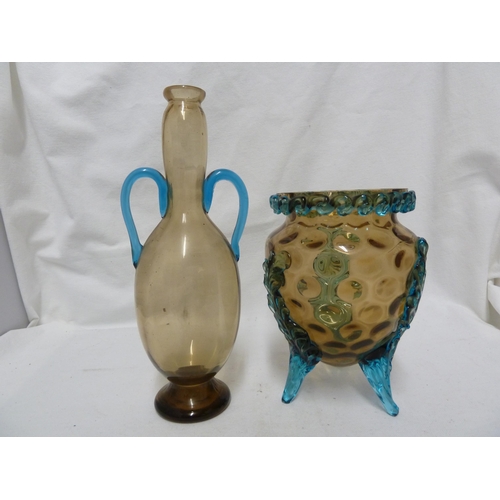 62 - Bohemian Glass - an amber glass vase applied with blue acanthus leaves on three feet; and an amber g... 