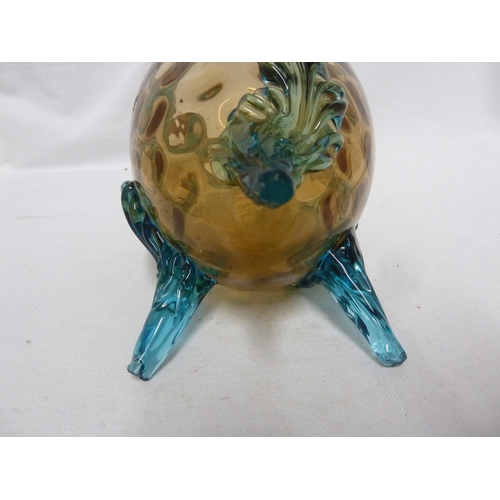 62 - Bohemian Glass - an amber glass vase applied with blue acanthus leaves on three feet; and an amber g... 