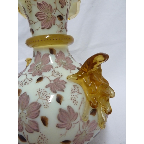 83 - Harrach - a cream glass vase of squat bottle form the frilled rim with amber glass trailing and enam... 