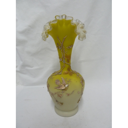 84 - Harrach - yellow frilled glass vase, of bottle form decorated with raised decoration of prunus and b... 