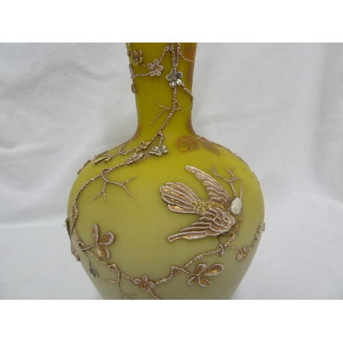 84 - Harrach - yellow frilled glass vase, of bottle form decorated with raised decoration of prunus and b... 