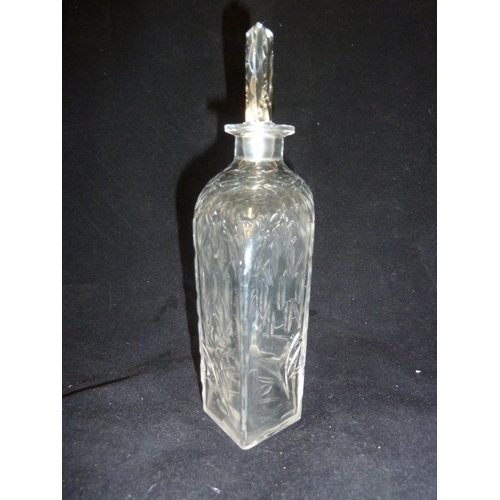 140 - James Powell & Sons, Whitefriars Limited - a Spanish cut glass decanter and stopper, 21cm high (2)