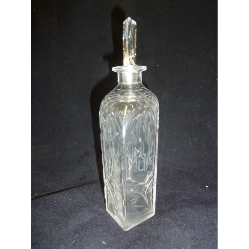 140 - James Powell & Sons, Whitefriars Limited - a Spanish cut glass decanter and stopper, 21cm high (2)