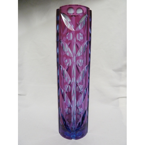 245 - Karel Wunsch - a cut glass cylinder vase, the fuschia overlay cut through to purple/blue with a styl... 