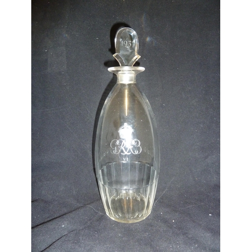 134 - Keith Murray - a 1937 commemorative glass decanter and stopper, of elongated ovoid form engraved wit... 