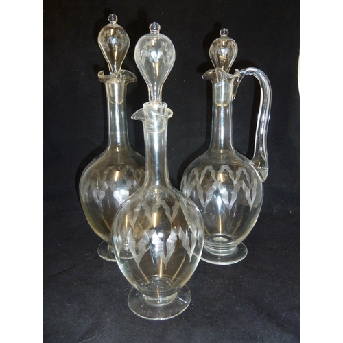 138 - James Powell & Sons, Whitefriars Limited - a wine set, comprising Claret jug with handle; red wine d... 