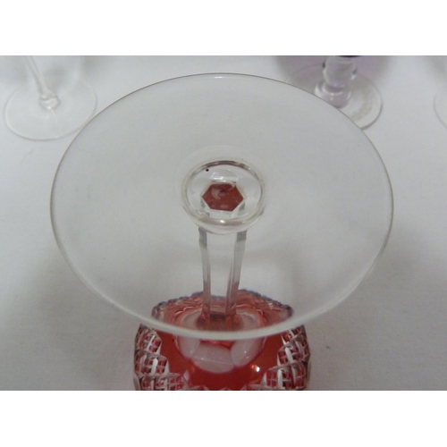 95 - Stourbridge Glass - a group of glasses, comprising a red cased wine glass with English Crest and mot... 