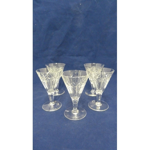 107 - Webb Corbett - five conical cocktail wine glasses of colourless glass, cut with a band of X cuts ove... 