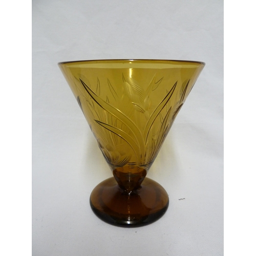 127 - Walsh Walsh - an amber conical glass vase, intaglio cut with Iris flowers, Waterlilies and leaves, 1... 