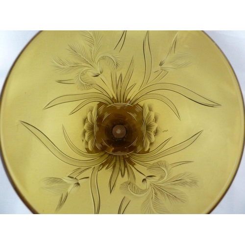 127 - Walsh Walsh - an amber conical glass vase, intaglio cut with Iris flowers, Waterlilies and leaves, 1... 