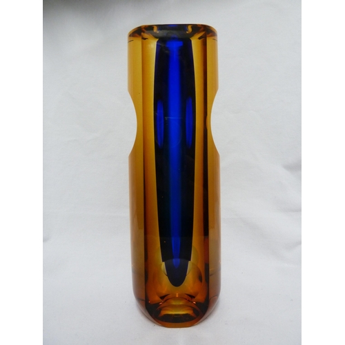 212 - Eduard Soukup - a glass sommerso vase, the amber/blue casing cut with slices and lenses, engraved si... 