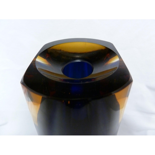 212 - Eduard Soukup - a glass sommerso vase, the amber/blue casing cut with slices and lenses, engraved si... 