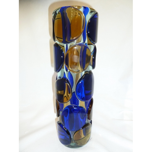 213 - Jaroslav Svoboda - a glass cylinder vase, colourless applied with with amber and blue pad spots, two... 