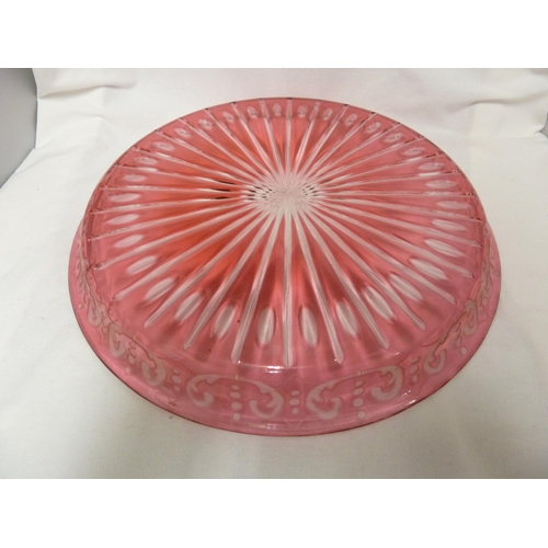 67 - Bohemian - a red flashed glass tray, circular, the base cut with a sunburst within a gallery edge cu... 