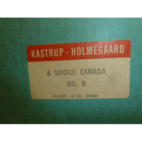 195 - Holmegaard - 12 Canada shape glasses, smoke colour, in two sizes, the larger size in original box, 1... 