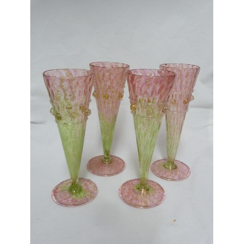 183 - Salviati - four champagne flutes, of conical form on circular bases, the body of rose pink graduatin... 