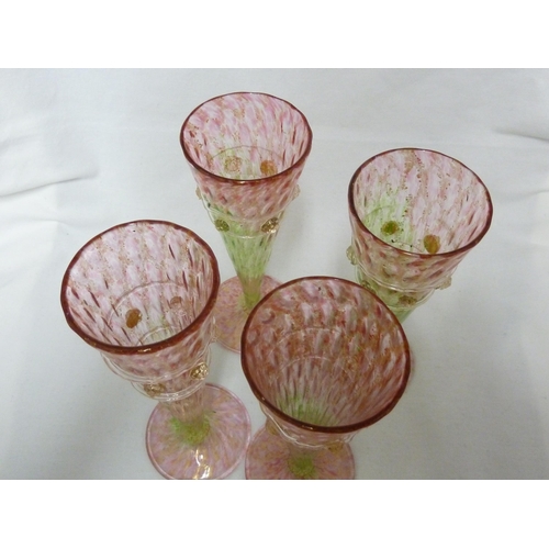 183 - Salviati - four champagne flutes, of conical form on circular bases, the body of rose pink graduatin... 