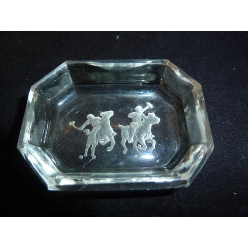 21 - Heinrich Hoffman - intaglio moulded glass small dishes, footballers and polo players; another simila... 