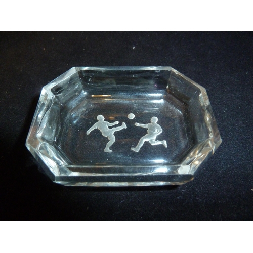 21 - Heinrich Hoffman - intaglio moulded glass small dishes, footballers and polo players; another simila... 