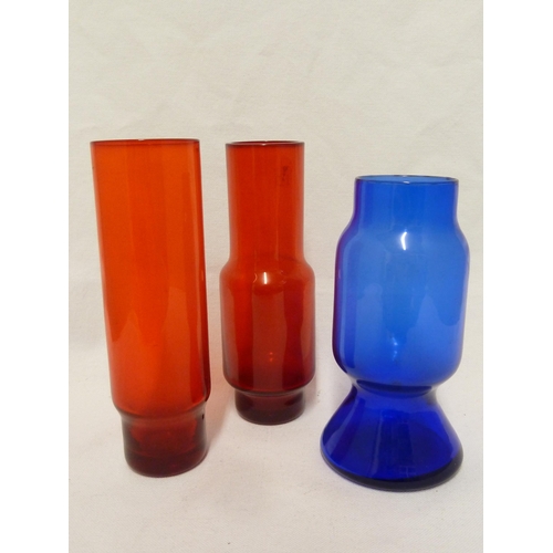 244 - Jan Gabrhel for Chribska Sklo, three glass cylinder vases, two of red colour and one of blue, Czecho... 