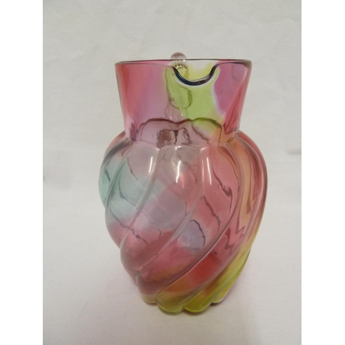 103 - Stevens and Williams - a Rainbow glass jug, of ovoid wrythen moulded body with applied colourless fl... 