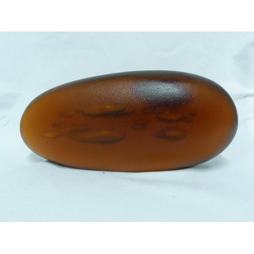 228 - Vladimir Jelinek for Skrdlovice - a Unica amber or Vzar Topas coloured glass 'pebble' with bubble in... 