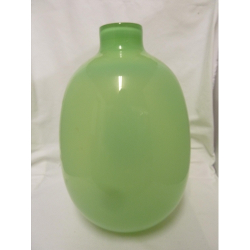 218 - Zbigniew Horbowy for the Krakow Glassworks - a green glass vase of ovoid form with short cylindrical... 