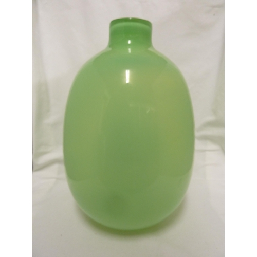 218 - Zbigniew Horbowy for the Krakow Glassworks - a green glass vase of ovoid form with short cylindrical... 