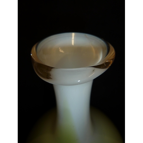 232 - Joseph Hodspodka - an ovoid glass bottle vase, in white graduating to bright green cased glass, part... 