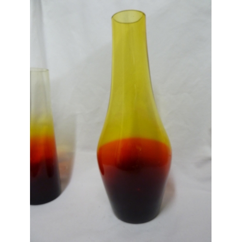 240 - Jan Gabrhel for Chlum u Trebone - Four Garnet glass vases, each graduating from red to yellow glass,... 