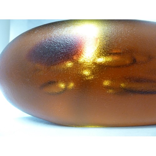 228 - Vladimir Jelinek for Skrdlovice - a Unica amber or Vzar Topas coloured glass 'pebble' with bubble in... 