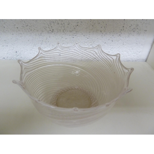 249 - A facon de Venise glass bowl, circular with barbed rim, white spiral latticino within colourless bod... 