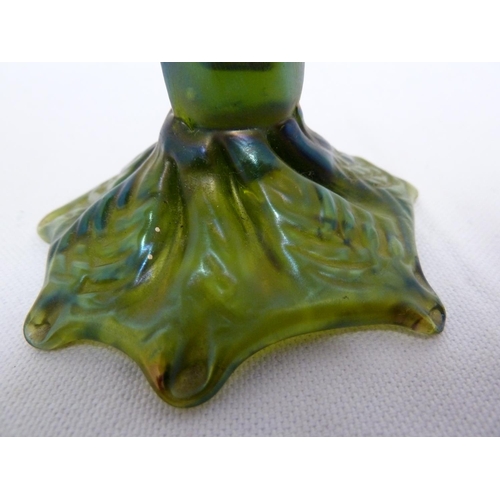 253 - A iridescent green glass solifleur thorn vase, in Loetz style, the cylindrical stem with applied tho... 