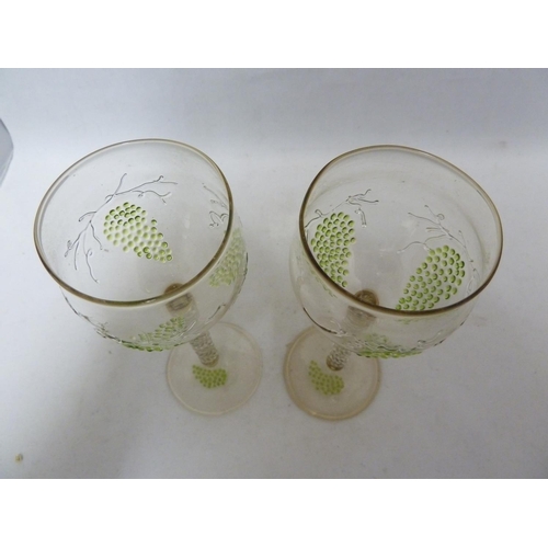 257 - Continental Glass - a pair of Jugenstil Hock wine glasses, decorated with green beaded grapes on a c... 