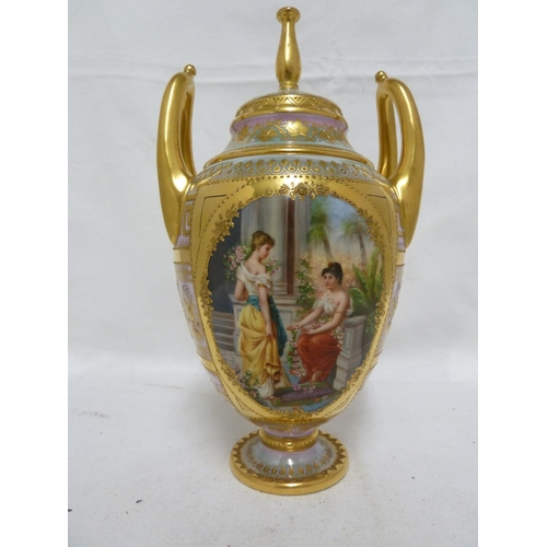 261 - A Vienna porcelain Krater urn and cover, signed Wagner, of ovoid form with high loop handles, decora... 