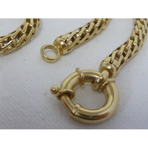 19 - A 375 marked yellow metal fancy rope link necklace, 51cm long, 23.6 grms