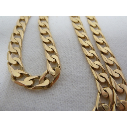 44 - A 375 marked yellow metal flat link necklace, 50.5cm long, 34.6grms