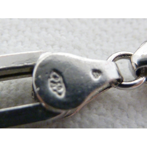 50 - A hallmarked platinum flattened chain bracelet, 20.5m long, 14.6 grms