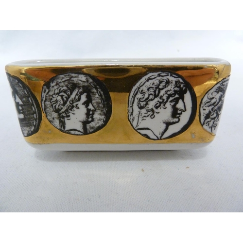 167 - Piero Fornasetti (1913-1988) - A rare porcelain table cigarette stand, with integral divided stand, ... 