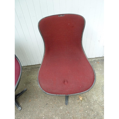 173 - A Royal Albert Hall stall chair, modern bucket seat shape on swivel stands, upholstered in cherry re... 