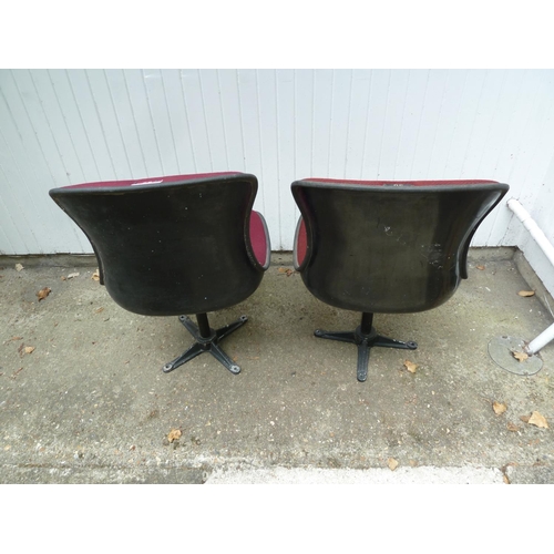 173 - A Royal Albert Hall stall chair, modern bucket seat shape on swivel stands, upholstered in cherry re... 