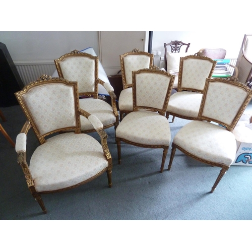 176 - A Louis XVI style salon set of six side chairs and two chairs with arms, gilded gesso frames surmoun... 