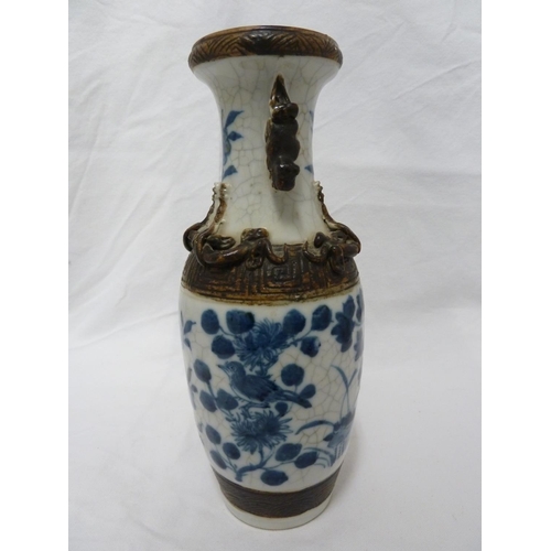 178 - A pair of Chinese porcelain crackle-ware vases, of baluster form decorated in blue and white with bi... 