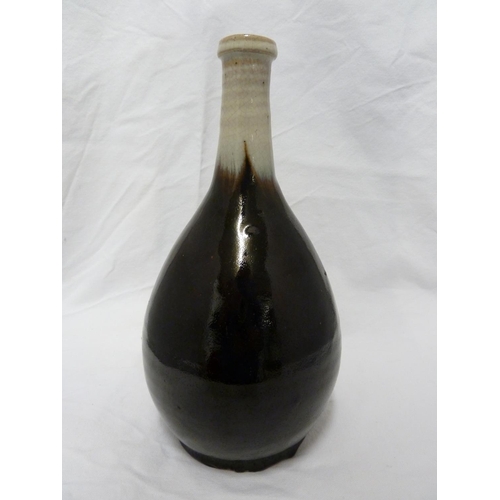 180 - A Japanese Chosen Karatsu sake bottle /vase, of smoke grey graduating to dark chocolate brown glaze,... 